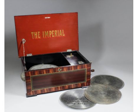 A late 19th Century "The Imperial" Polyphon to take 9.125ins metal disks, with 3.5ins steel single comb, contained in grained