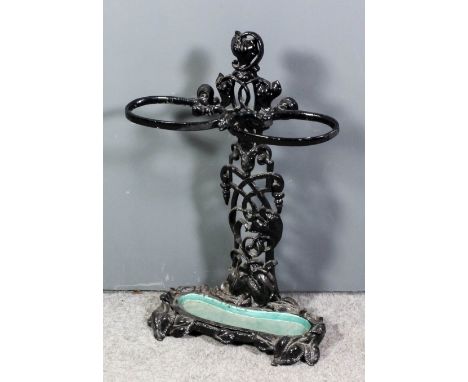 A 19th Century black painted cast iron two division umbrella/stick stand, pierced and cast with interlaced scrolls, flowers a