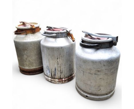 Agricultural salvage - three large aluminium milk churns