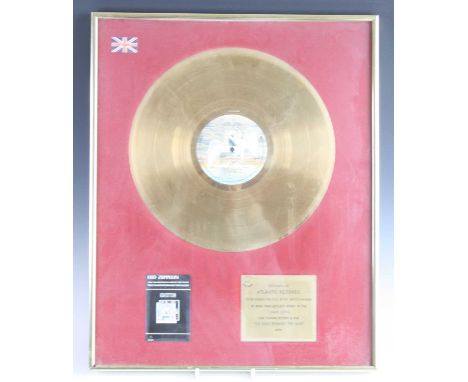 Led Zeppelin, The Song Remains The Same, Swan Song SSK 89402A1 gold disc with presentation plaque below "Presented to Atlanti