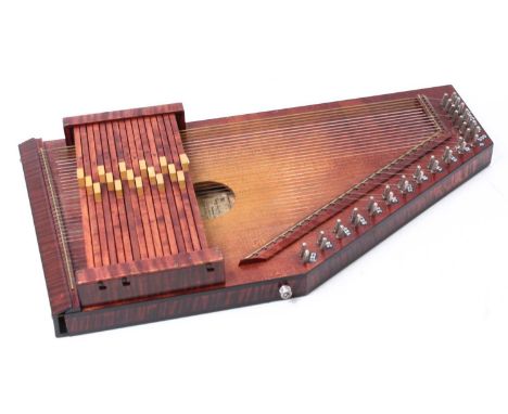 An American auto harp bearing a label for Goose Acres Music Centre, Cleveland, Ohio, No. A4A61399 having 16 bars with three l