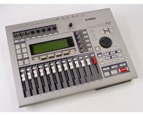 A Yamaha AW16G, a Professional Audio Workstation, serial No. 1MO1023, width 43cm, depth 31cm, height 9cm, in original box and