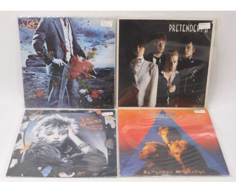 A collection of assorted LPs, various dates and genres to include The Rockin' Berries - XI (signed to the cover); Yes - Torma