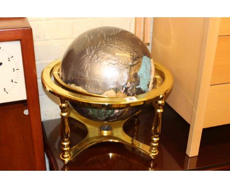 Semi-precious stone celestial globe on grey ground