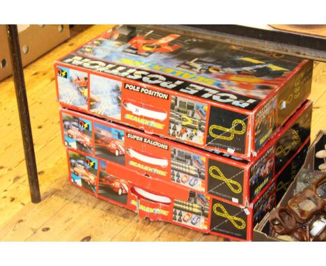 Three boxes of Scalextric cars, track and accessories