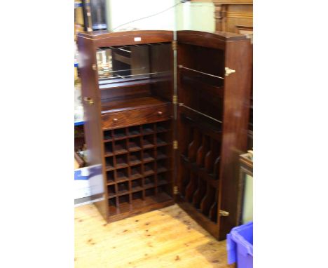 Mahogany and brass bound cocktail cabinet in the form of a cabin trunk