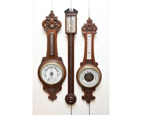 A 19th century mahogany stick barometer, the index with thermometer and signed I.Binda, the case with broken pediment and box