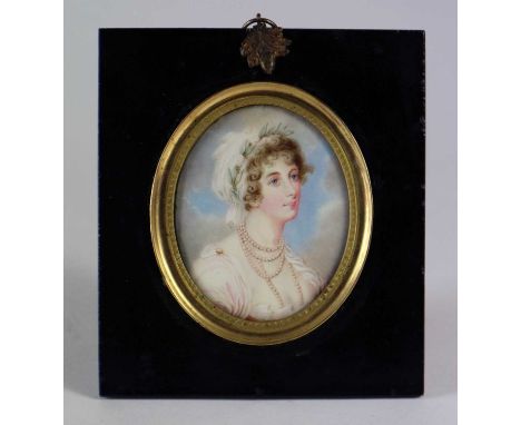 British School (Early 19th Century) Portrait Miniature of a Lady with rope pearls around her neck, a white cap with garland i