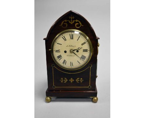 A 19th century mahogany arch-top repeater bracket or mantel clock, J. Tilbury of Guernsey, the case inlaid with brass foliate