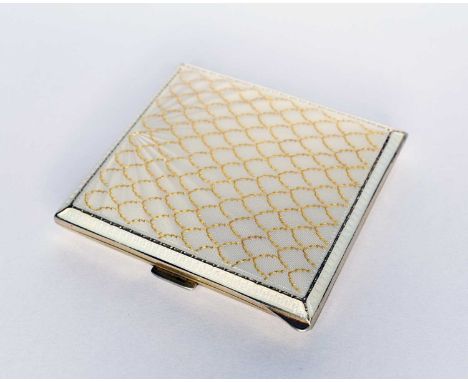 A silver gilt and enamel cigarette case, Albert Carter, Birmingham 1949, the cream enamel cover with gold fan motif, 8cm high