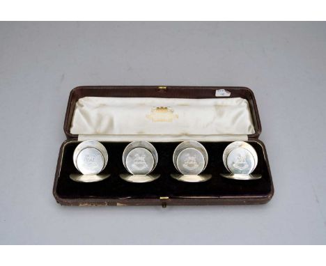An Edwardian cased set of four silver menu holders, Samspon Mordan &amp; Co, Chester 1904, each with engraved crest, within '