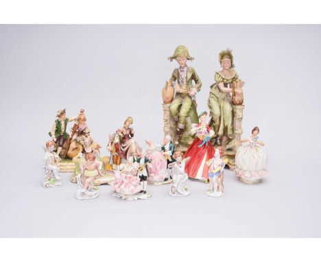 A group of various Continental porcelain figures and a Royal Worcester figureincluding a small oil lamp modelled with three p
