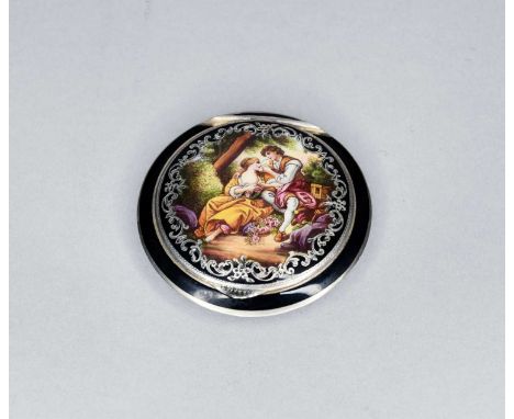An Austrian silver and enamel circular compact, the black compact with figural decorative cover, opening to reveal mirrored i