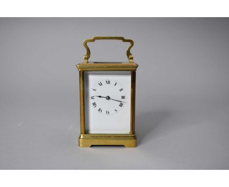 An early-mid 20th century French carriage clock, in an obis case, with a 2.5” enamelled dial and Roman numerals, the 8-day mo