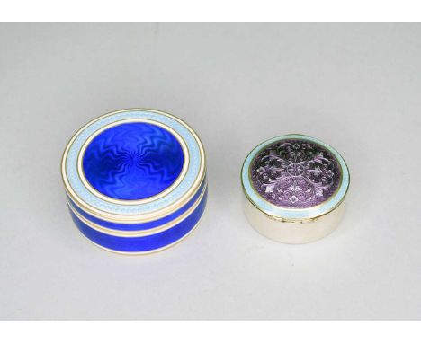 A continental silver gilt and enamel circular box and cover, the Royal blue enamel body white enamel borders and two tone blu