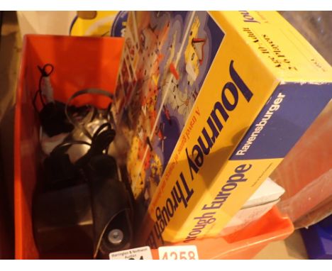 Box of mixed items including games and a Zenim camera