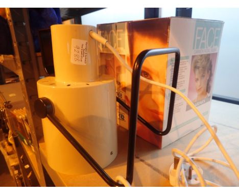 Carmen facial sauna and a Pifco heat lamp