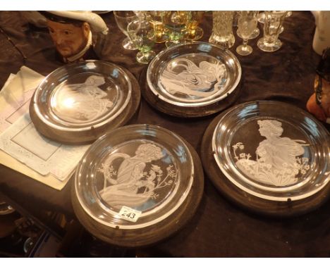 Four Intaglio hand carved crystal plates by Michael Yates with certificates and wall hangers