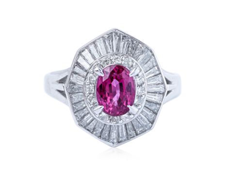A RUBY AND DIAMOND RING Featuring an oval cut ruby weighing approximately 1.49 Cts (marked), mounted in a platinum setting ma