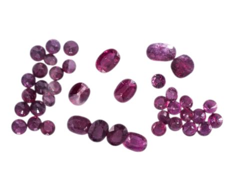 A GROUP OF LOOSE RUBY GEMSTONES
Featuring a group of loose rubies, totalling approximately 13.2 Cts, one tested at random to 