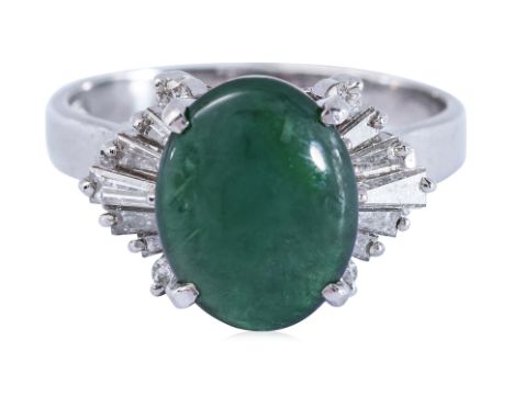 A TYPE A JADEITE AND DIAMOND RING Featuring an oval cabochon jadeite piece weighing approximately 2.54 Cts (marked), mounted 