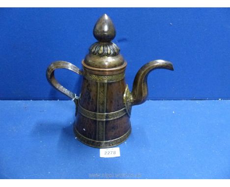 A 19th c. Tibetan copper and brass Teapot.