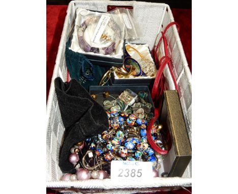 A basket of mixed jewellery including glass beads, amethyst bracelet, brooches, Abalone shell bracelet and necklace etc.