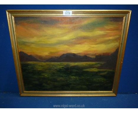 An unsigned oil on canvas of a seascape at sunset.