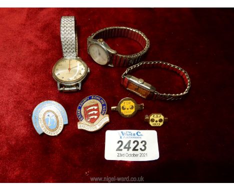 Three wristwatches including Cyma, Limit and Timex together with enamel pins for Essex Bowling Club, FDF badges etc.