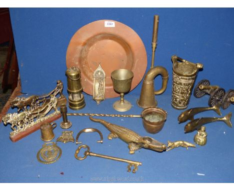 A quantity of brass including car horn, small Davy lamp, two cannons, Crocodile nut cracker etc