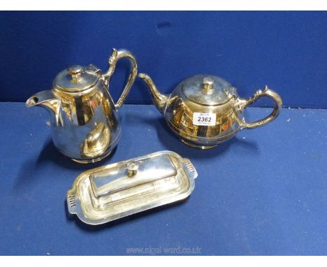 A Walker &amp; Hall plated Teapot and hot water jug with a plated butter dish.