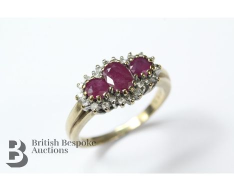 9ct yellow gold ruby and diamond ring, stamped 375, mm SJ, the ring set with one oval-cut ruby approx 5 x 4mm and two other 4