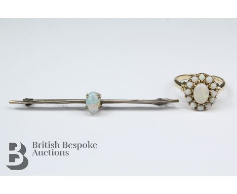 10ct yellow gold and opal ring, size P, together with a 9ct pin brooch with steel pin, gross weight approx 5.12 gms.&nbsp; No