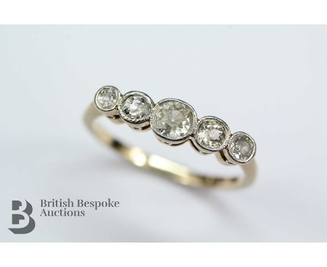 18ct yellow gold, platinum and diamond ring, set with five diamonds approx 60 pts, size N+, approx 2.6 gms.&nbsp; Note: centr