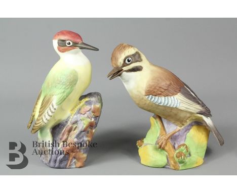 Two Royal Worcester birds; Woodpecker no 3245 and Jay no 3248. Woodpecker is in fine condition with no chips, cracks or break