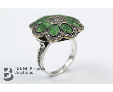 Vintage 9ct gold, silver, emerald dress ring, the ring set with eight oval emerald approx 7 x 4mm, size O, 9.1 gms.