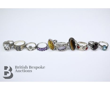 Ten silver rings, including a five stone amethyst ring, amethysts approx 6 x 4 mm stamped 925 size P, cornelian wire band rin