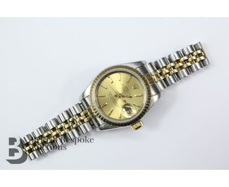 Lady's Bi-metal Rolex Oyster Automatic wrist watch, the watch having a gold face with baton numerals and date aperture, movem