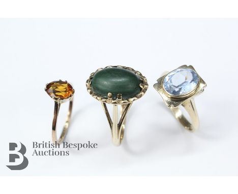 Three 9ct yellow gold rings, including blue topaz ring, Birmingham hallmark dated 1966 mm W &amp; G size O (wear to stone sur