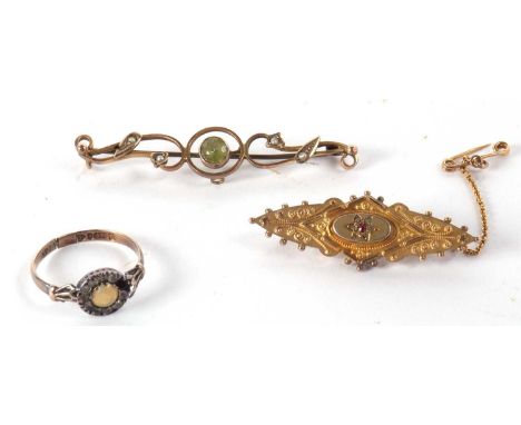 A peridot and seed pearl bar brooch, indistinctly stamped, probably 9ct, 5.5cm long, cased, together with a 9ct ruby and diam