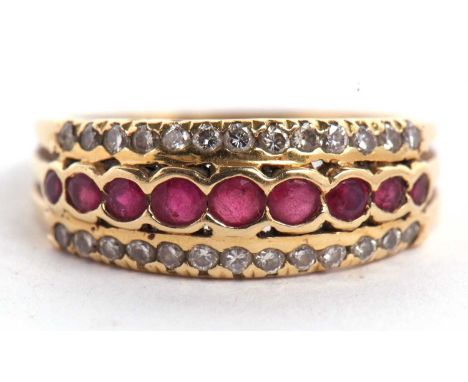 An 18ct ruby and diamond ring, the central row of round rubies, set above and below with a row of small round diamonds, total