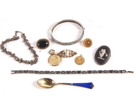 Mixed lot to include a silver gilt and blue enamel teaspoon by David Anderson, Norway, a bloodstone brooch, a split pearl bar
