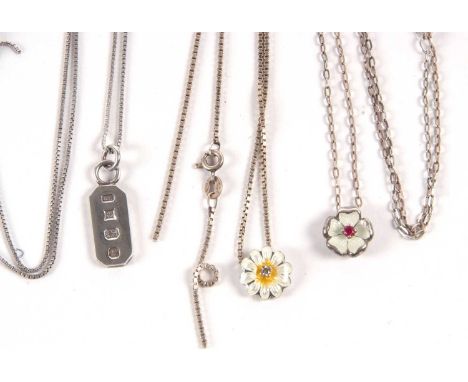 Two floral gemset and enamel pendant necklaces, one daisy pendant in white and yellow enamel set with a small round diamond, 
