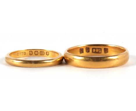 A 22ct gold wedding band, hallmarked London 1948, size I, 2.3g, together with another ring indistinctly stamped 22 (marks wor