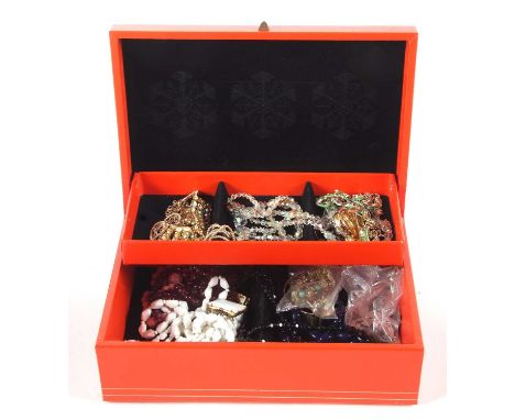 A box of costume jewellery to include a six strand milk glass choker, a gilt metal and green and white enamel Lily of the Val