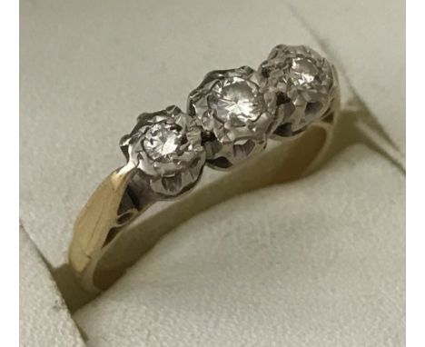 18ct gold diamond trilogy ring. 3 diamonds set in illusion settings.  Size approx. K  . Total weight approx 2.6g