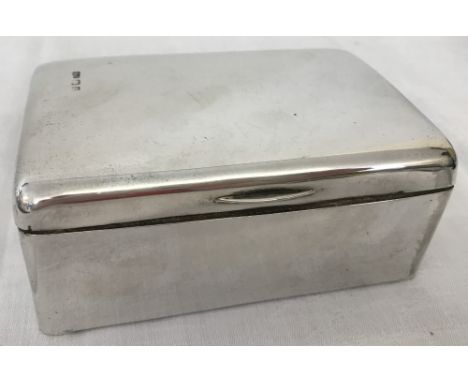 A silver trinket box hallmarked Birmingham 1901. Wood lined top, base and interior. Hallmarks to lid and base. Total weight a