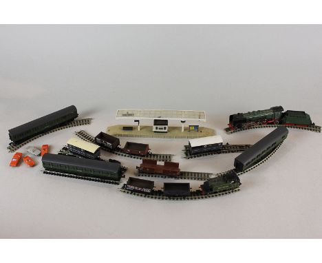 Trix and Graham Farish, N gauge model railway, including a locomotive and tender, tank engine, three carriages, rolling stock