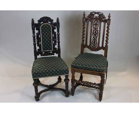 A carved oak high back chair with solid seat and another with upholstered back panel