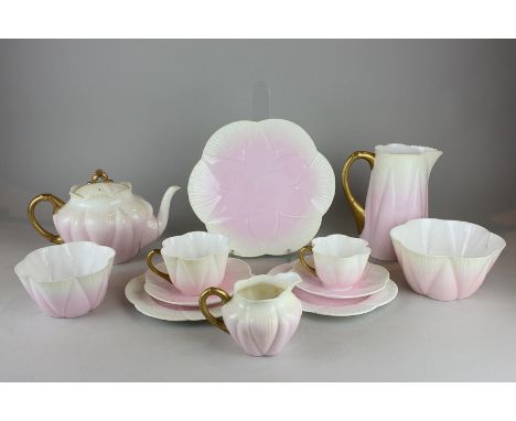 A Foley china pink tinted part tea set of cups, saucers, teapot, jug, etc